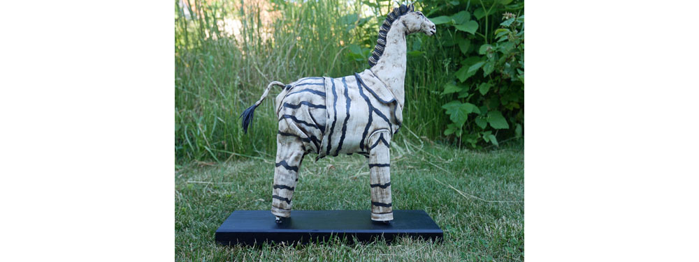 Hästskulptur zebra - med pyjamas