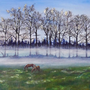 Tavla med betande hästar med dimma i bakgrunden