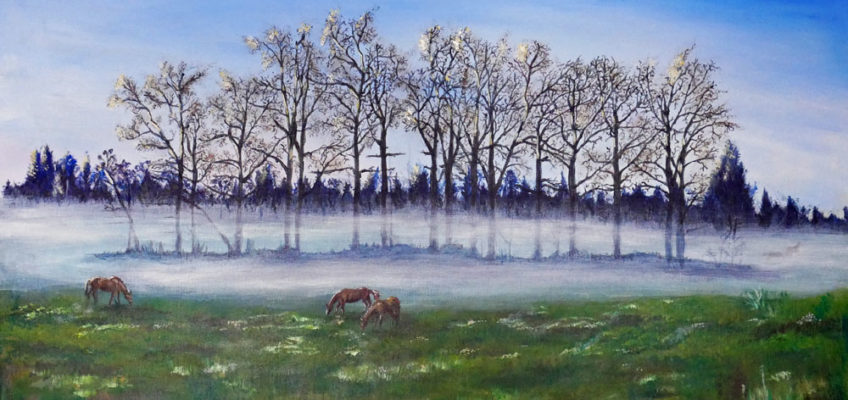 Tavla med betande hästar med dimma i bakgrunden