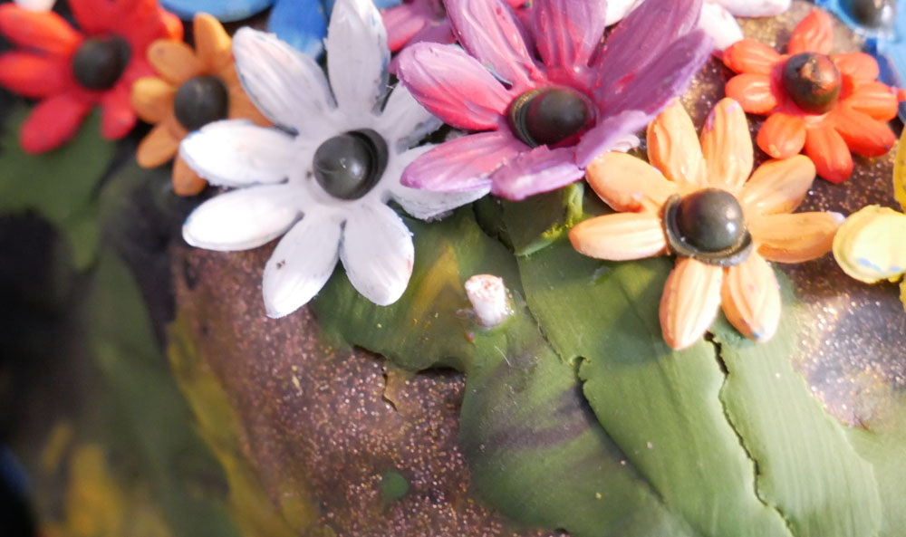 polymer clay flowers and a little piece of bamboo